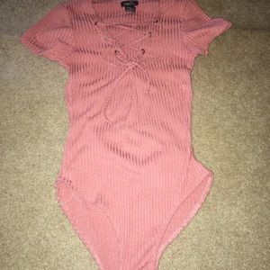 Pink body suit